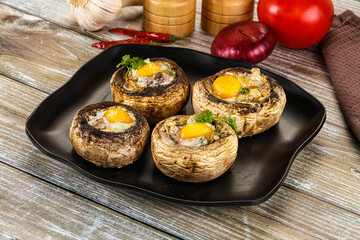 Baked champignon with quail egg