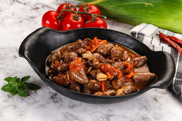 Baked chicken hearts with vegetables