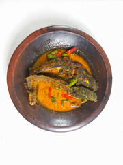 Recipe consisting of fried catfish, coconut milk, chili, and a few other ingredients. Typical Yogyakarta meal. Indonesian cuisine.