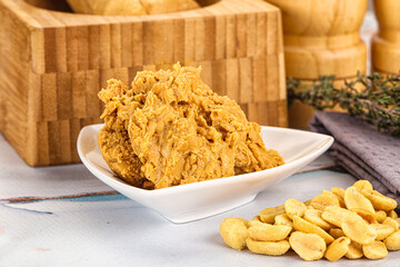 Crunchy peanut butter fat product