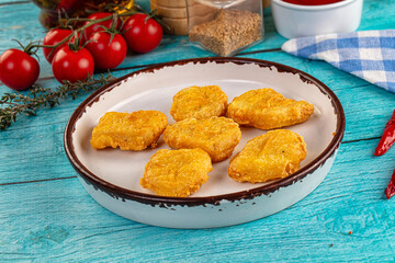 Golden crispy fried chicken nuggets