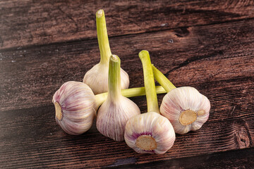 Raw young garlic bulb heap