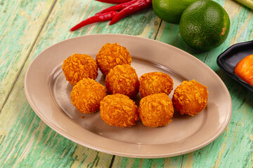 Fried crispy yellow cheese balls