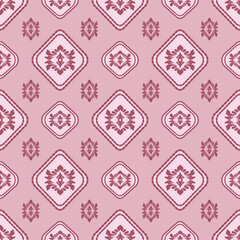 Pink diamond seamless pattern with abstract flowers on pink background.