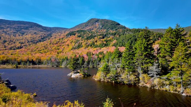 Scenic landscape of Beaver pond in New Hampshire during autumn time..