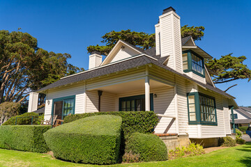 Classic American House with Front Yard and Blue Sky