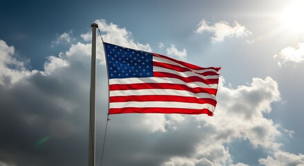 Obraz premium American Flag Waving Proudly Against a Cloudy Sky A Symbol of Freedom and Patriotism