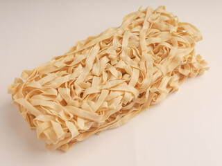 Dry instant noodles on white background