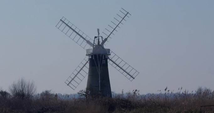 shot of St benet&rsquo;s mill with the river Thurne