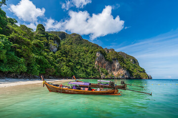Traditional long tail boat on famous Monkey beach, Phi Phi Islands, Thailand