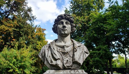 Fototapeta premium Crumbling Historical Statue in Park Surrounded by Lush Greenery