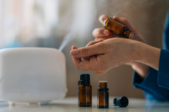Aromatherapy with essential oils and diffuser at home