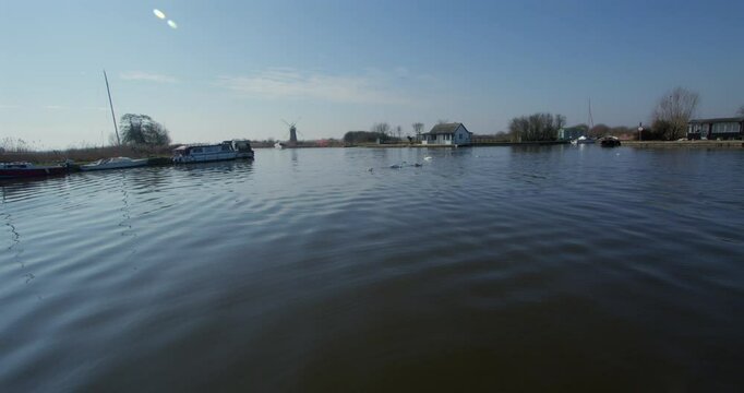 Shot of the river Thurne at the village of Thurne