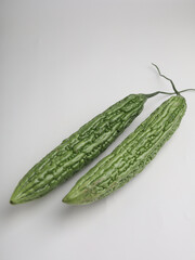 Bitter gourd or bitter melon on white background