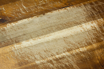 
A close-up of an old wooden cutting board.