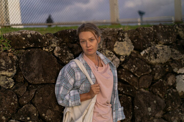 Woman traveller at Cape Byron Lighthouse, New South Wales