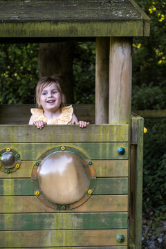 Little 5 years old girl at outdoor playground