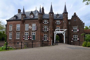 The front entrance of the Maurick Castle, near Vught, Netherlands. Shot on a cloudy day. 

