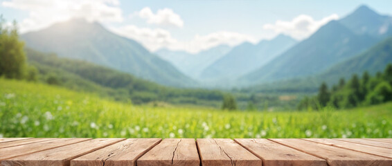 Wooden table top on blur mountain and grass field.Fresh and Relax concept.For montage product display or design key visual layout.View of copy space.