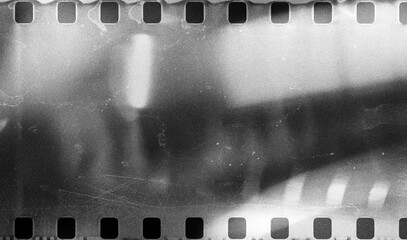 vintage black and white film frame texture with grainy light leak overlay for retro web design,...
