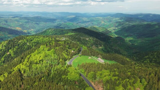 aerial shot revealing the Monts d'Ardeche regional parc on a sunny summer day, Auvergne Rhone Alpes region, France