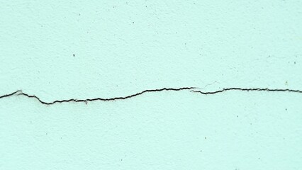 Cracked Wall: A detailed image of a crack on a wall, subtly evoking a sense of imperfection and the passage of time. This shot captures a subtle texture