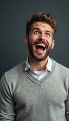 Joyful man with a beard expressing pure happiness