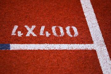 Line with number 4x400 meter running track