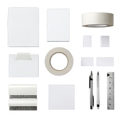Assorted blank white paper, tape, and office supplies