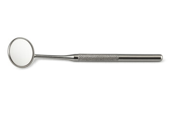 Dental mirror lying on transparent background for checkup