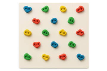 Colorful climbing holds on white board with transparent background