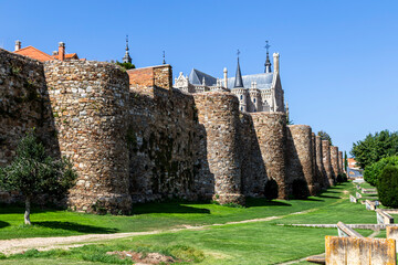 Ancient Roman Walls of Astorga with Episcopal Palace by Gaudí in Background, Spain