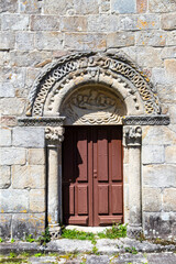 Historic Romanesque Portal with Sculpted Figures at the Church of Santiago de Cereixo, Galicia,...