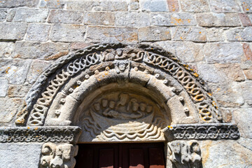 Detailed Romanesque Portal and Carvings at the Church of Santiago de Cereixo, Galicia, Spain