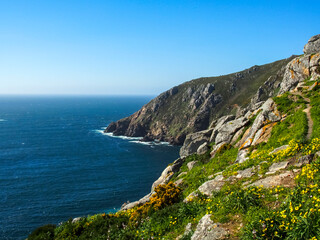Rugged Cliffs and Wild Coastline at Cape Finisterre (Fisterra), A Coruña, Galicia, Spain.