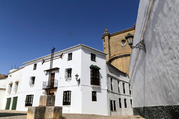 The square and surrounding traditional buildings contribute to the historic character of the town. It is located in Ronda, Málaga, Andalusia, Spain.