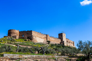 Castle of Medellín (Castillo de Medellín) in Badajoz, Spain, a prominent medieval fortress with origins dating back to the 13th century and significant additions through the 15th century