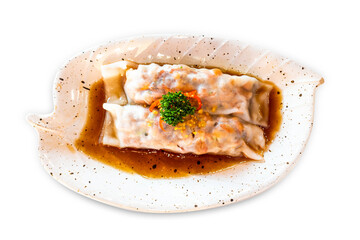Top view of Cha siew pork wrapped noodle, focus selective