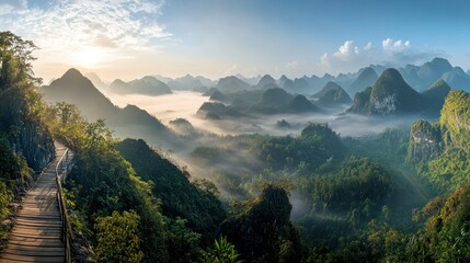 Misty Mountain Sunrise: A Panoramic View of Lush Landscapes