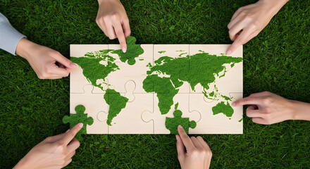 a group of people solving world puzzle