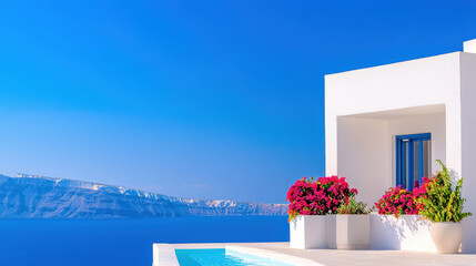Stunning view of serene Santorini villa with vibrant flowers, clear blue sky, and tranquil sea