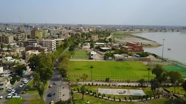 Drone Aerial Footage of the Statue of Scheherazade and Shahriyar by the Tigris River in Baghdad, Iraq