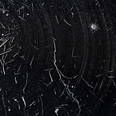 Worn-Out Vinyl Record Surface with Dust and Scratches – Macro Close-Up