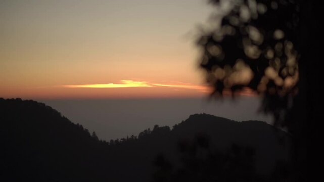 Winterline Mountain Sunset &ndash; Breathtaking View of the Mountain Range Silhouetted Against a Vibrant Sunset Sky with Layered Peaks and Warm Golden Light
