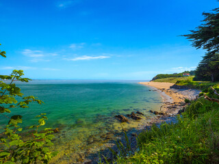 Quiet clear water beach in Priory Bay (Caldey Island, Tenby, Wales, United Kingdom)