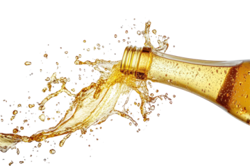 A bottle of golden liquid pours, creating a dynamic splash and spray against a black background; the liquid is translucent, showcasing its effervescence and movement