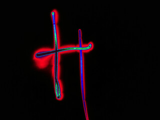 Glowing English letter H. On a black background with colored neon lines, a letter of the English alphabet is written by hand. The letter glows pink-red, creating a green-blue halo around it.