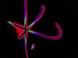 Glowing English letter K. On a black background with colored neon lines, a letter of the English alphabet is written by hand. The letter glows pink-red, creating a green-blue halo around it.