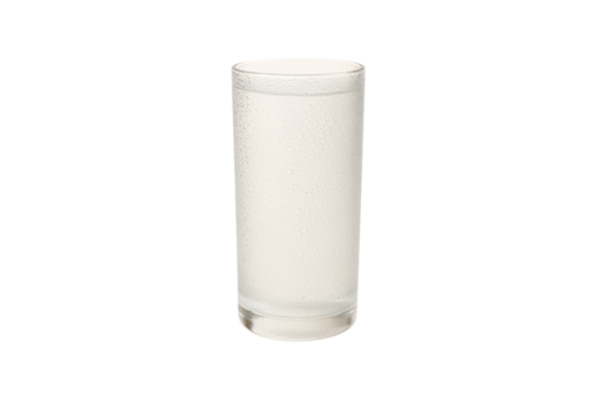 Empty clear glass tumbler with textured surface pattern and thick bottom base, isolated on a transparent background