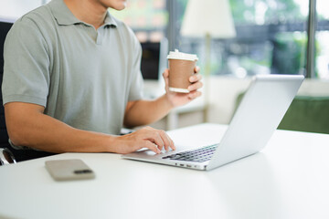 Businessman s hands typing on smartphone, tablet and laptop keyboard computer